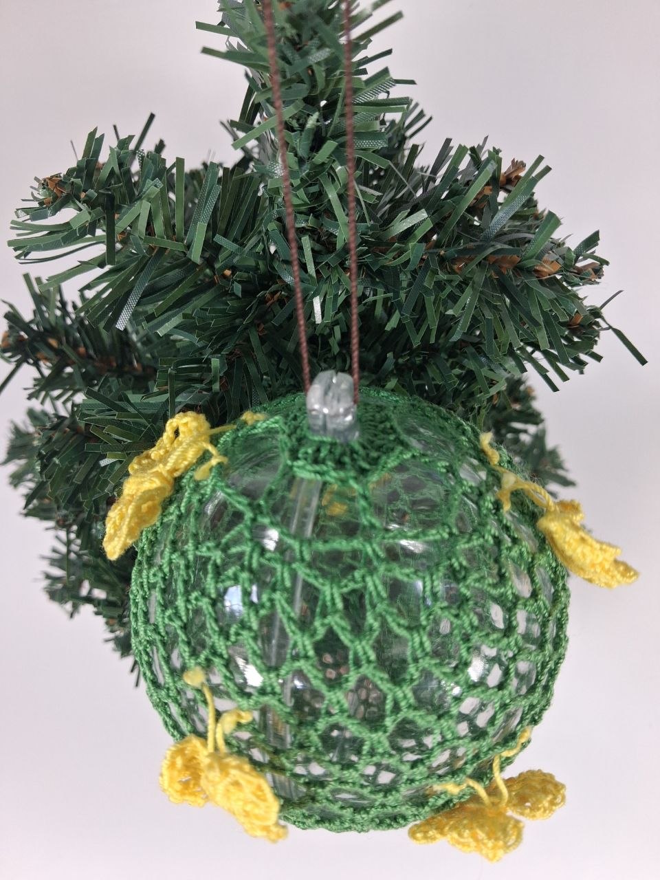 Green Crochet Christmas Bauble with butterfly