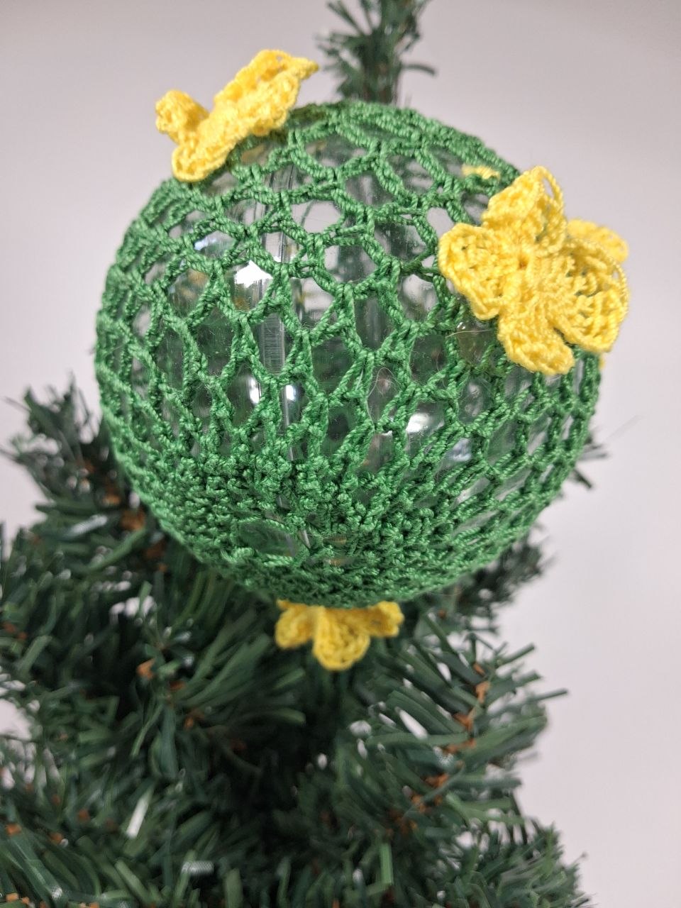 Green Crochet Christmas Bauble with butterfly