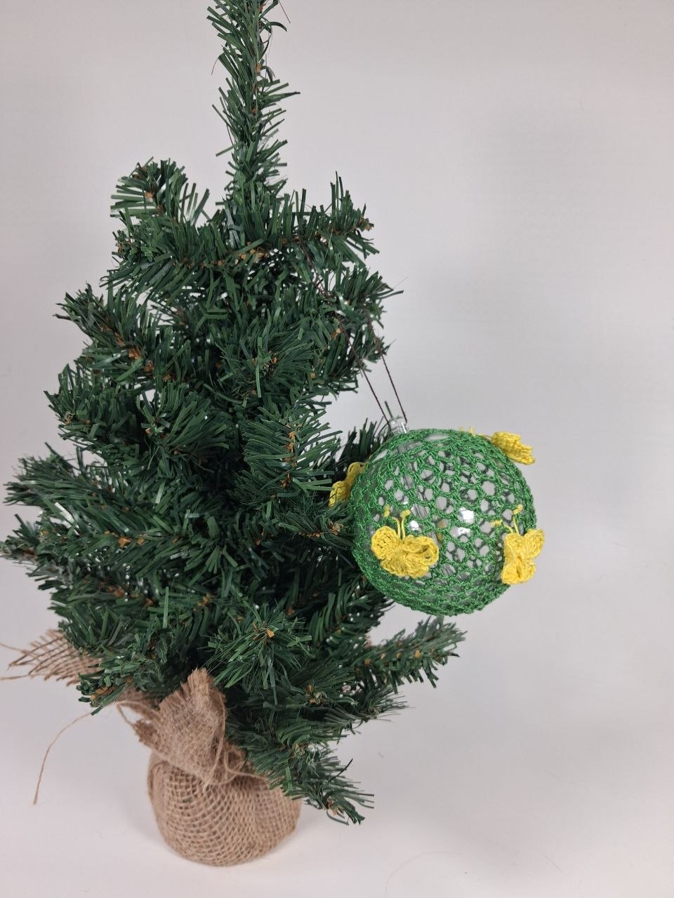 Green Crochet Christmas Bauble with butterfly